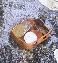 Coins left at ruined abbey