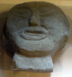 Stone head on display at visitor centre