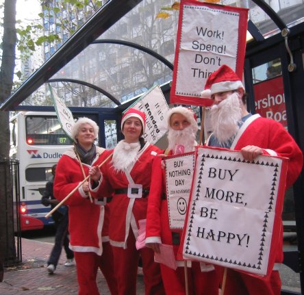 Buy Nothing Day santas queing for the bus..